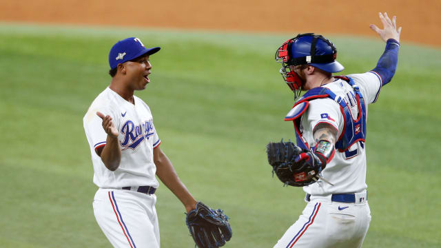Oct 10, 2023; Arlington, Texas, USA; Texas Rangers relief pitcher Jose Leclerc (25) and catcher Jonah Heim (28) celebrate after defeating the Baltimore Orioles in game three of the ALDS for the 2023 MLB playoffs at Globe Life Field. Mandatory Credit: Andrew Dieb-USA TODAY Sports